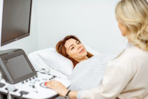 A lady having an ultrasound who suffers from gynaecological and fertility problems due to a specific medical condition.
