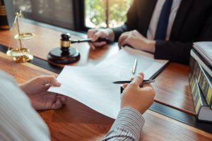 A traumatic brain injury lawyer helps a client to claim head injury compensation